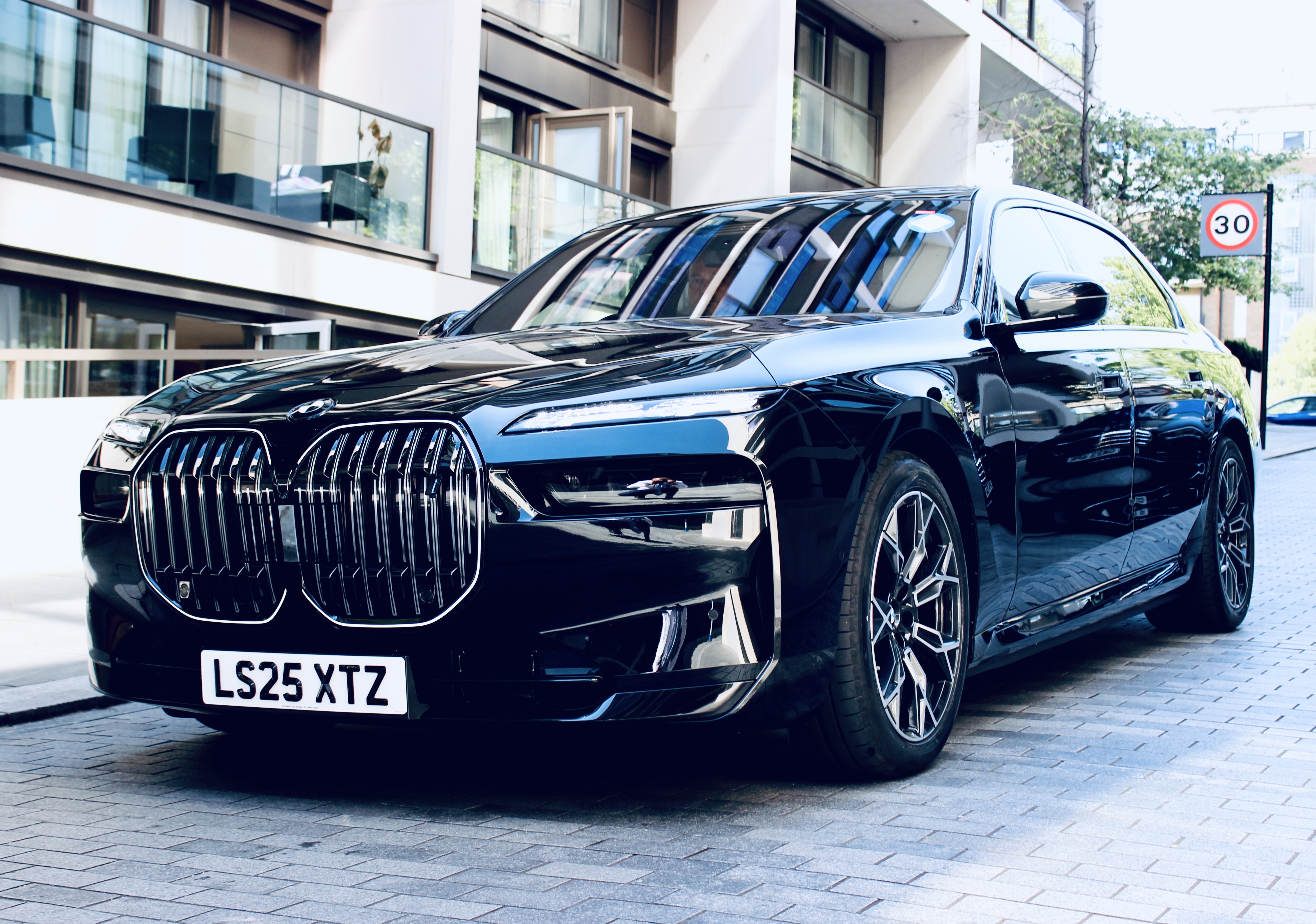 Black BMW i7 electric chauffeur car in London